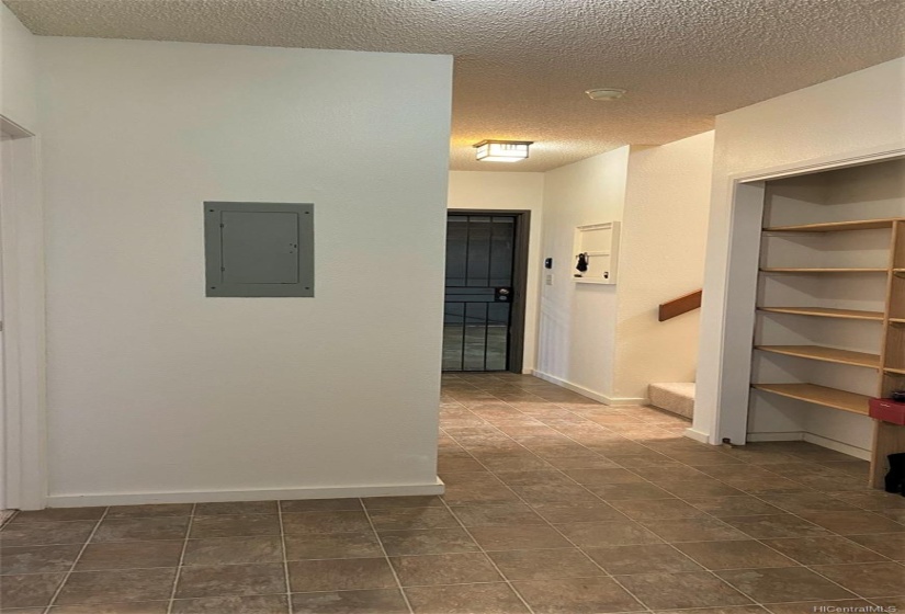 Downstairs garage entry and hall.