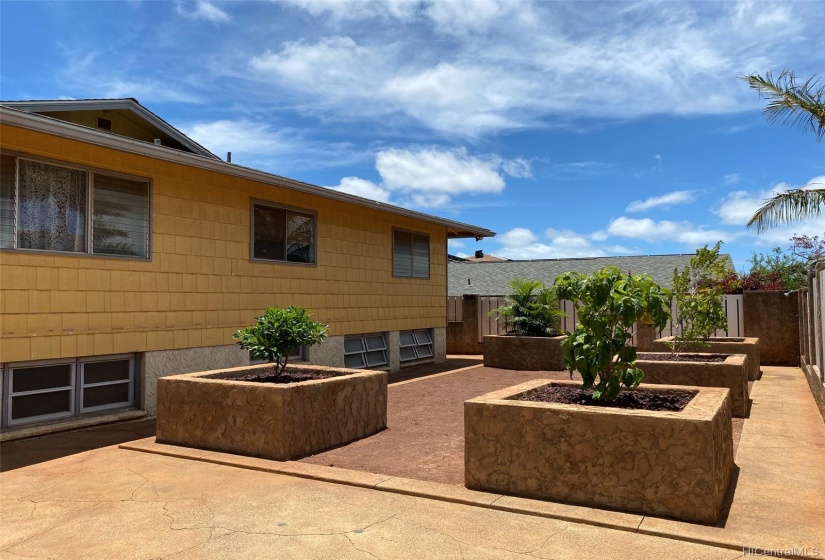 Back of the home with the planter boxes.