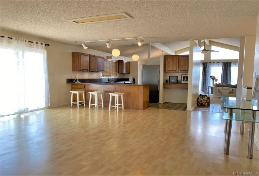 Family room from bar looking at the kitchen.