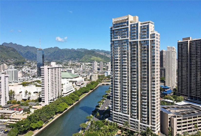 What an elegant building! Green roof on the other side of Ala Wai Canal is Hawaii Convention Center.