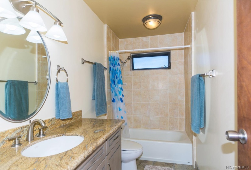 Hall Bathroom upstairs for the 3 bedrooms - Granite Counters and gorgeous floors!