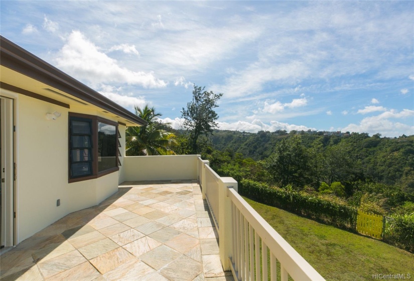 This is the lanai off the master bedroom suite!  Imagine sitting with your morning coffee or watching the sunset overlooking the valley, every day!