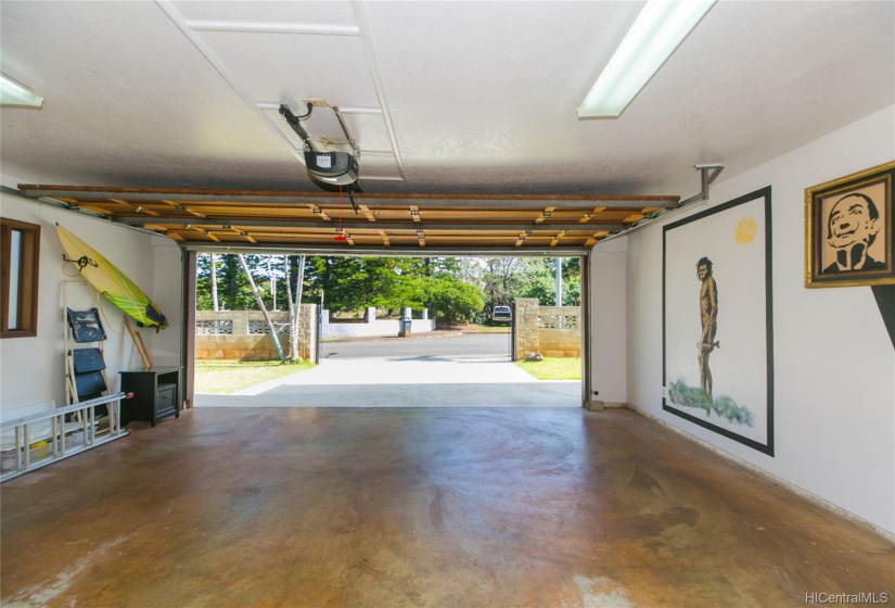 Large 560 sq ft 2 car garage with new automatic garage door opener.  Owner's Son is an artist and will leave his artwork on the walls.  Across the street is open and woodsy and you can hear the ironwood trees blowing in the wind!