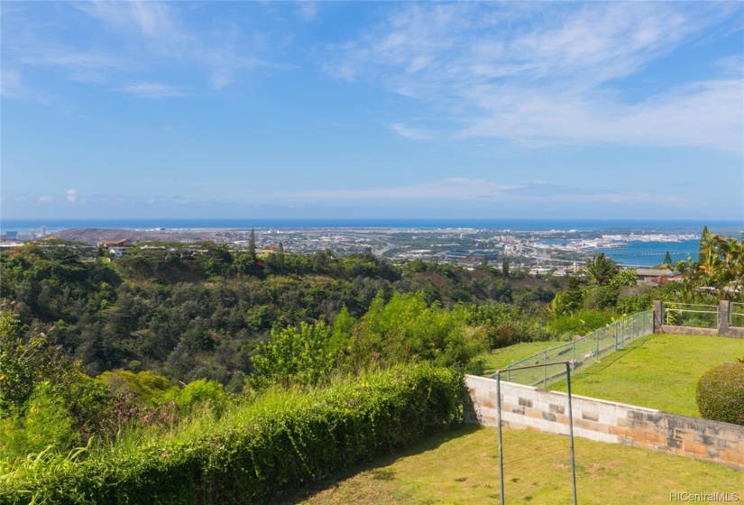 Sweeping Gorgeous views of Sparkling Pacific Ocean and Pearl Harbor, with City Lights and Valley below!  you feel on top of the world in this Beautiful Setting!