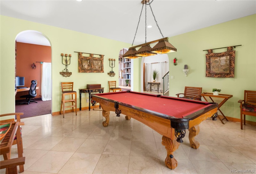 Centrifugal to the Entertaining you'll do at this home is the formal Billiard that also has a doorway connecting to the back Entertaining Courtyard!