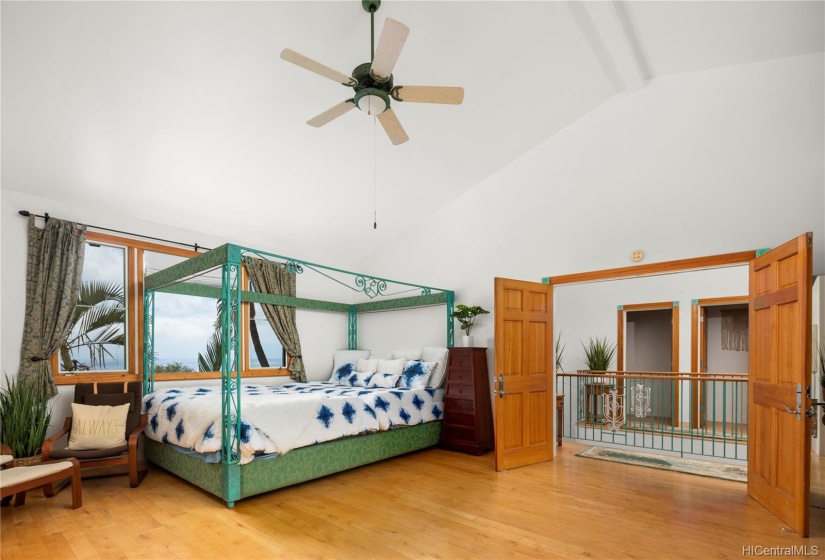 Wide French Doors Open to the Master Suite that has remarkable Ocean Views by your large bed!