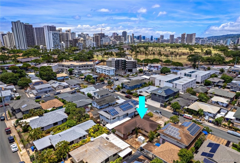 This rear angle of the property showcases the proximity to the Ala Wai Golf Course and Waikiki.