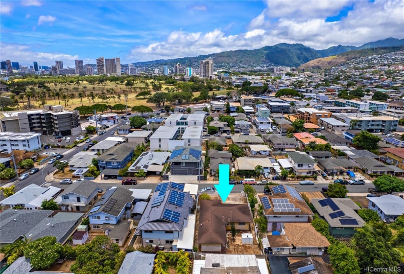 Conveniently located close to University of Hawaii, Ala Moana, Kakaako & more.  Majestic Manoa mountains are shown in the aerial backdrop.