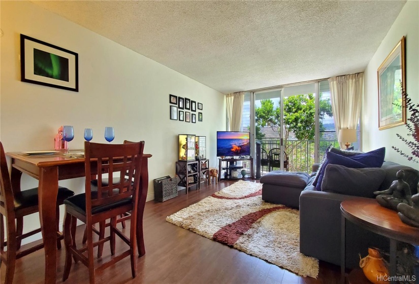 Dining and living room w/ wood laminate floors