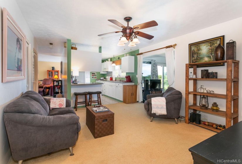 Family room with kitchen and hall way