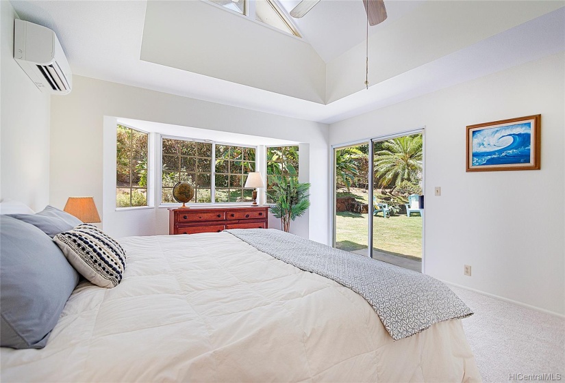 Sliding glass door leads to the backyard and additional windows for natural light.