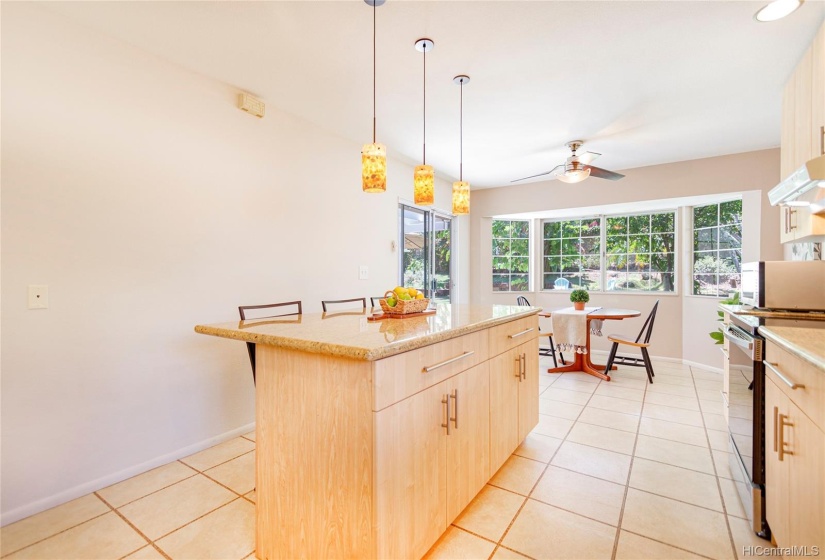 Large kitchen island adds storage & is perfect for food prep & counter height dining.