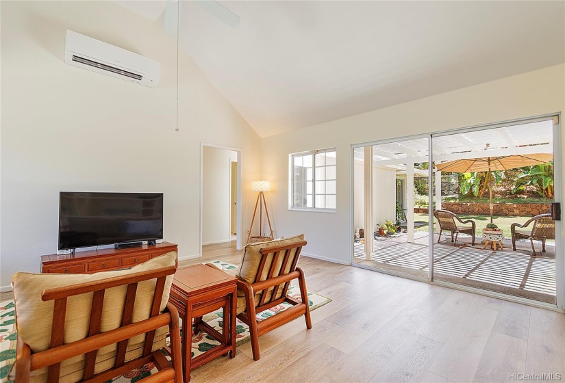 Living room connects the two wings of the house.