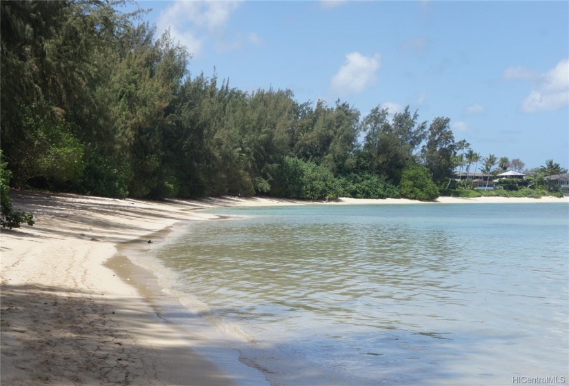 The sands of Kawela Bay seen from the East side of the bay.