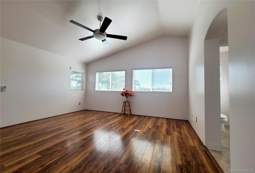 Master bedroom with cathedral ceilings attached bath & walk in closet