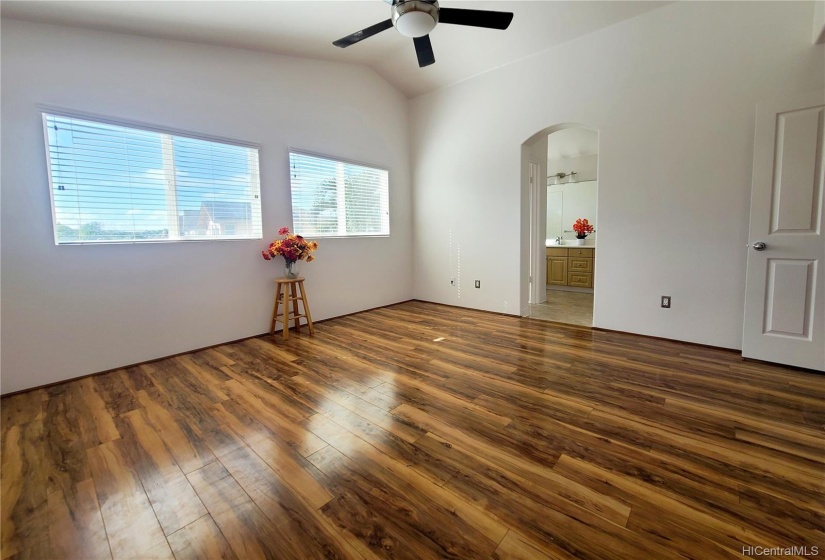 Master bedroom with cathedral ceilings attached bath & walk in closet