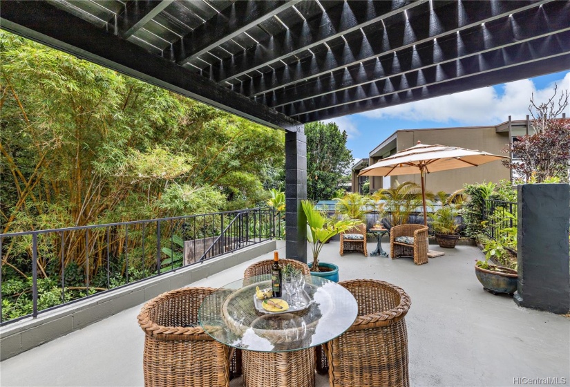 One of 3 Patios to entertain friends and family with views of the flowing Stream and the beautiful, natural Landscape.