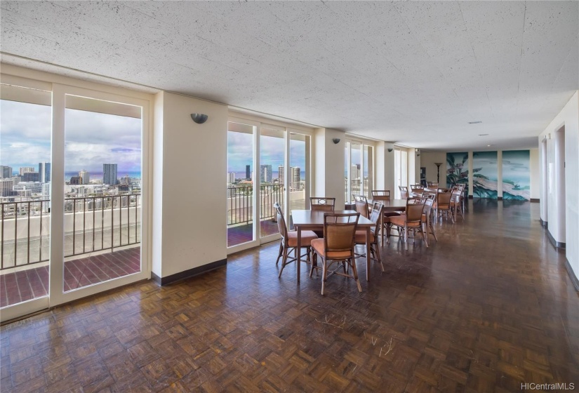 Huge top floor recreation/party room with full kitchen. Gorgeous views of the city, ocean and Diamond Head.