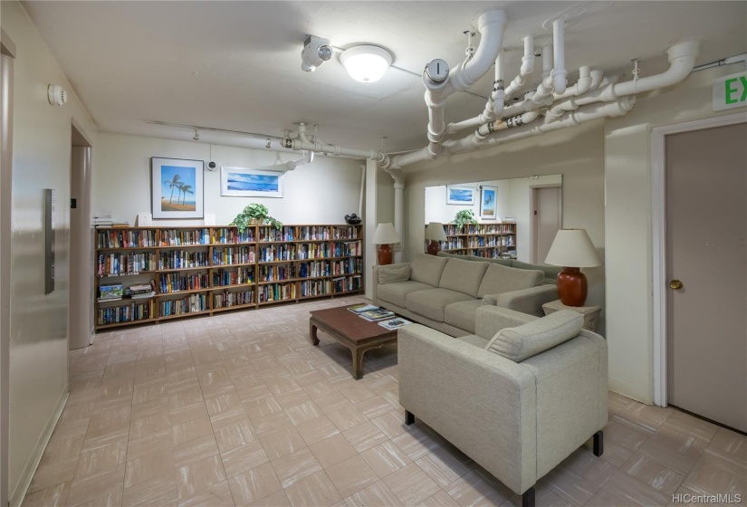 Sitting area and library off of the community laundry and gym area.  I love doing laundry and catching up on my reading.