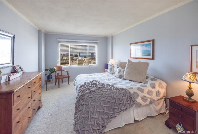 Huge bedroom with gorgeous views of the city skyline.  Did you say you want a walk in closet?