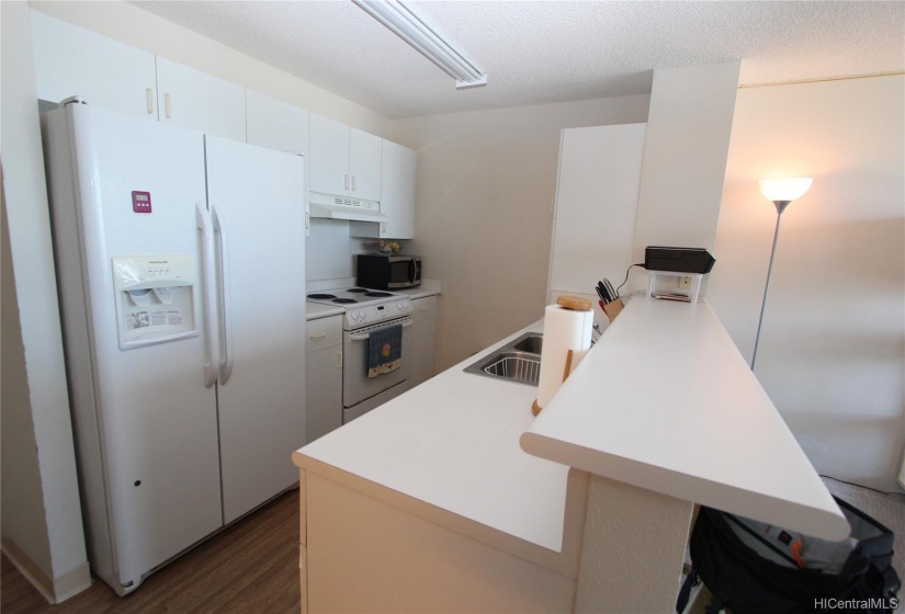 Open Kitchen to the living area with high bar counter