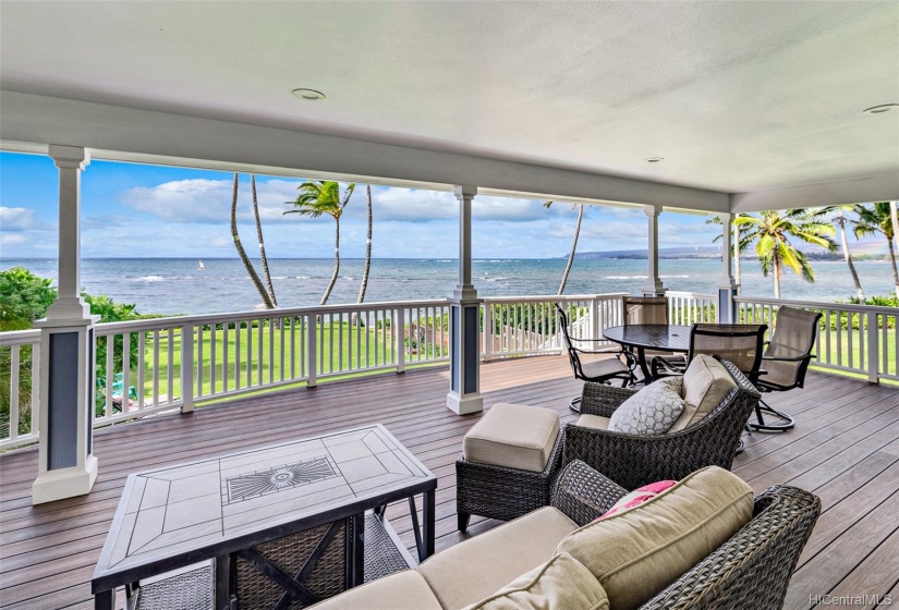 Enjoy the panoramic ocean views of waves, whales, andHawaiian sunsets from the covered lanai with stairs leading down to the pool, grassy area and beach!