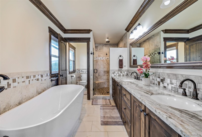 Executive Master Bath with walk-in shower and tub.