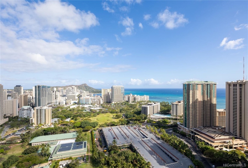 Leahi aka Diamond Head sits proudly in the distance, with Fort Derussy park down below.