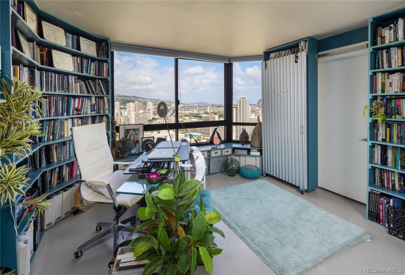 Currently used as an office, this bedroom and bathroom also has amazing views, especially from the built-in window bench.