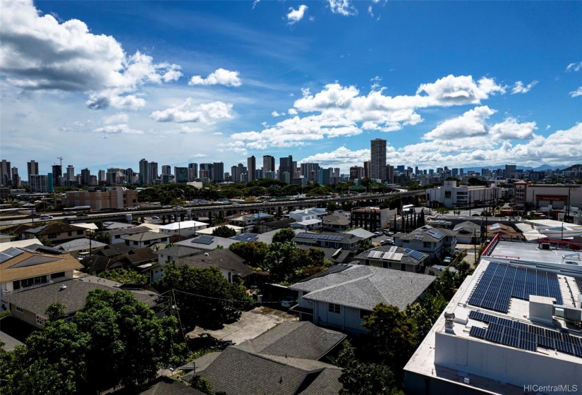 CITY AND PEEKABOO OCEAN VIEW FROM 50 FEET UP, CENTER OF THE LOT