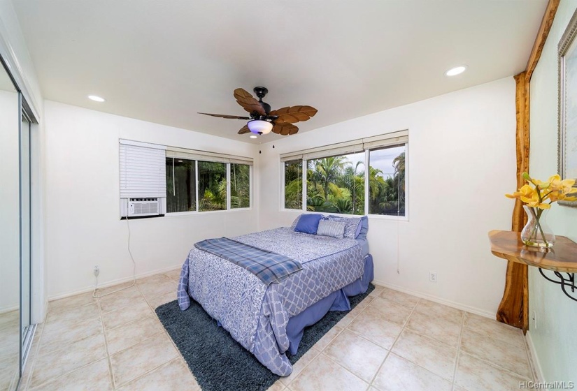 Guest bedroom. Mountain and garden views.