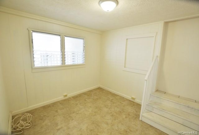 Front Unit Bedroom with blocked stairs to back unit.