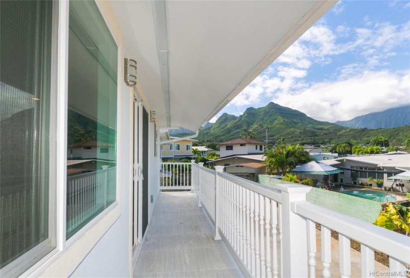 upstairs balcony front house looking West