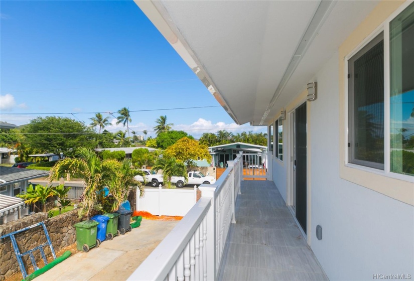 upstairs balcony front house looking East