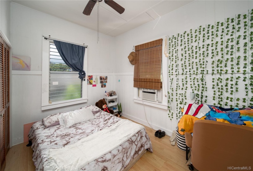 High ceilings in these bedrooms contribute to the spacious feel