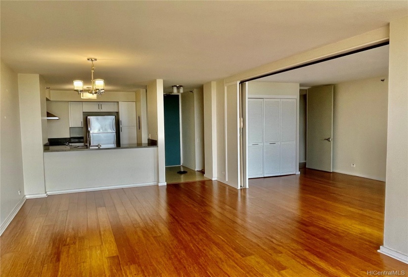 Open concept living/dining with bamboo floors