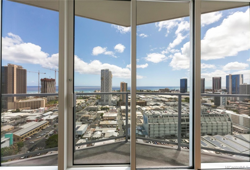 View from living room of ocean and city