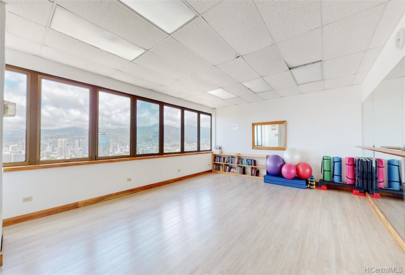 The rooftop amenity deck also features a recreation room that is perfect for yoga, exercise videos, and dancing/ballet practice.