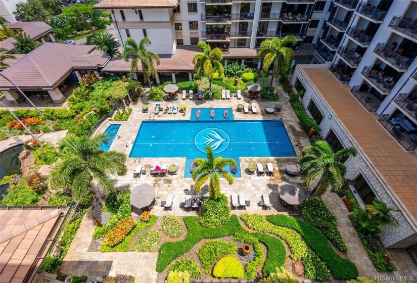 View of the lap pool and landscaped grounds from the main lanai.