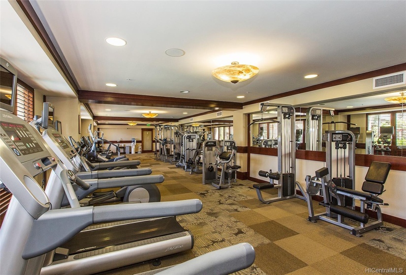 Large fitness center with a wide variety of equipment, dry sauna, steam room, showers, lockers.