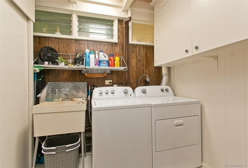 New Whirlpool washer and dryer. This laundry room is between the family room and the 2nd master bedroom. A 30 gal. water heater was installed in 2021.