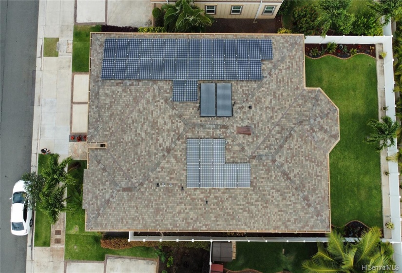 Aerial lot view. Home comes with 37 owned panels including water heater panels