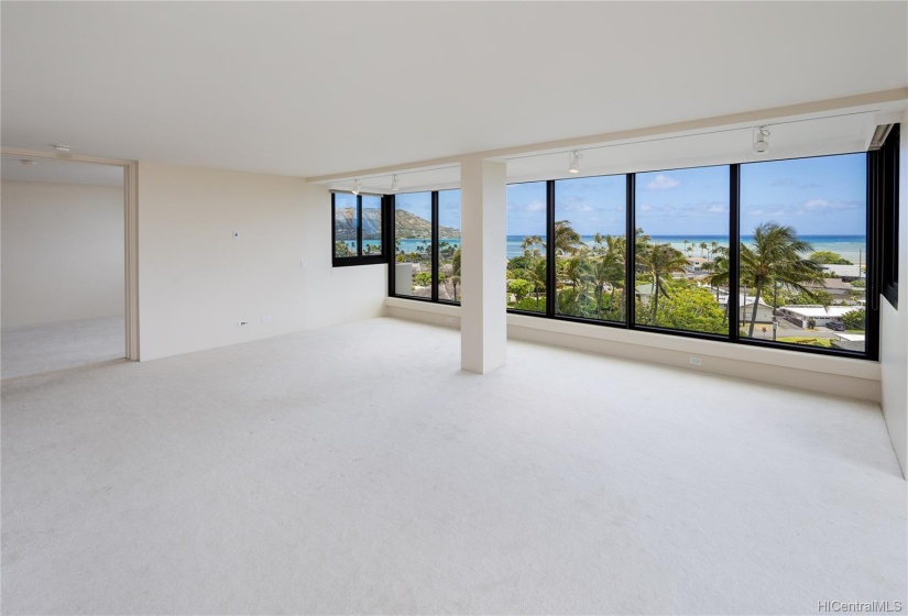 This spacious living room area shows off the view and new windows!  Enjoy your favorite furniture in this space.