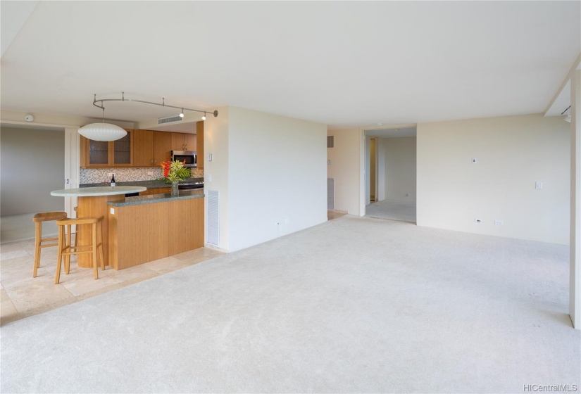 This view is to the kitchen, and the doorway to the master bedroom