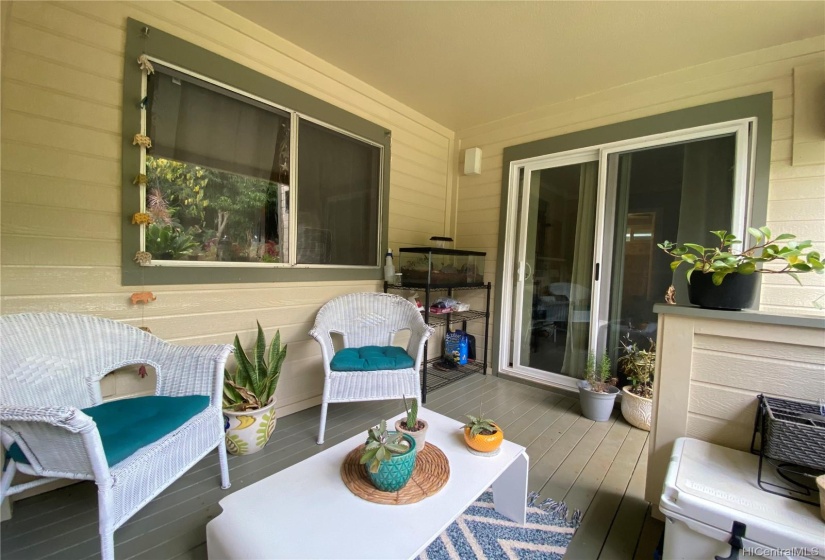 Darling covered lanai off master in backyard