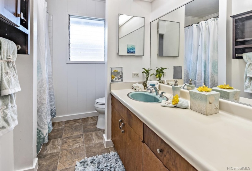 Full size Bathroom located between Bedrooms #2 and #3.