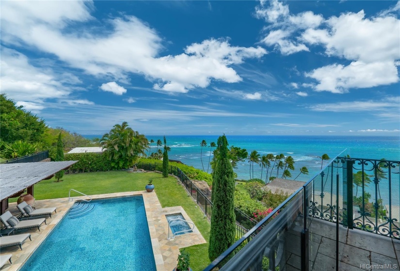 View from one of main upstairs bedroom balconies toward guest cottage.  Views from everywhere in this breathtaking home!