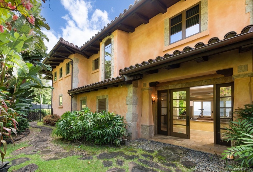 Courtyard into living room, you are immediately welcomed with HUGE ocean views!