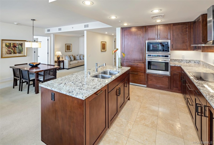 Kitchen and Dining area w/den in the distance