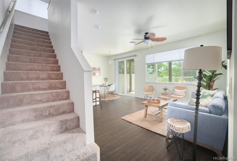 Entering the home is the stairs to the left that lead up to the 3 bedrooms plus bonus room.